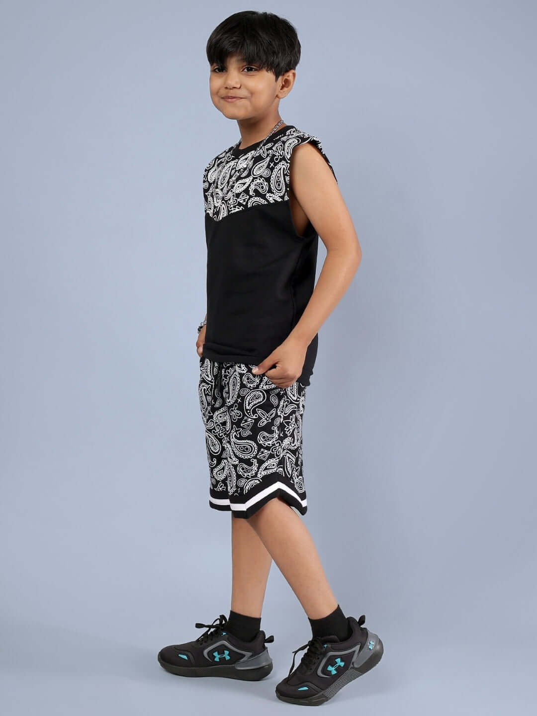 Boy wearing FREESTYLER CO-ORD FOR BOYS & GIRLS BLACK, showcasing the stylish design and comfort of this made-to-order outfit by DUDS.