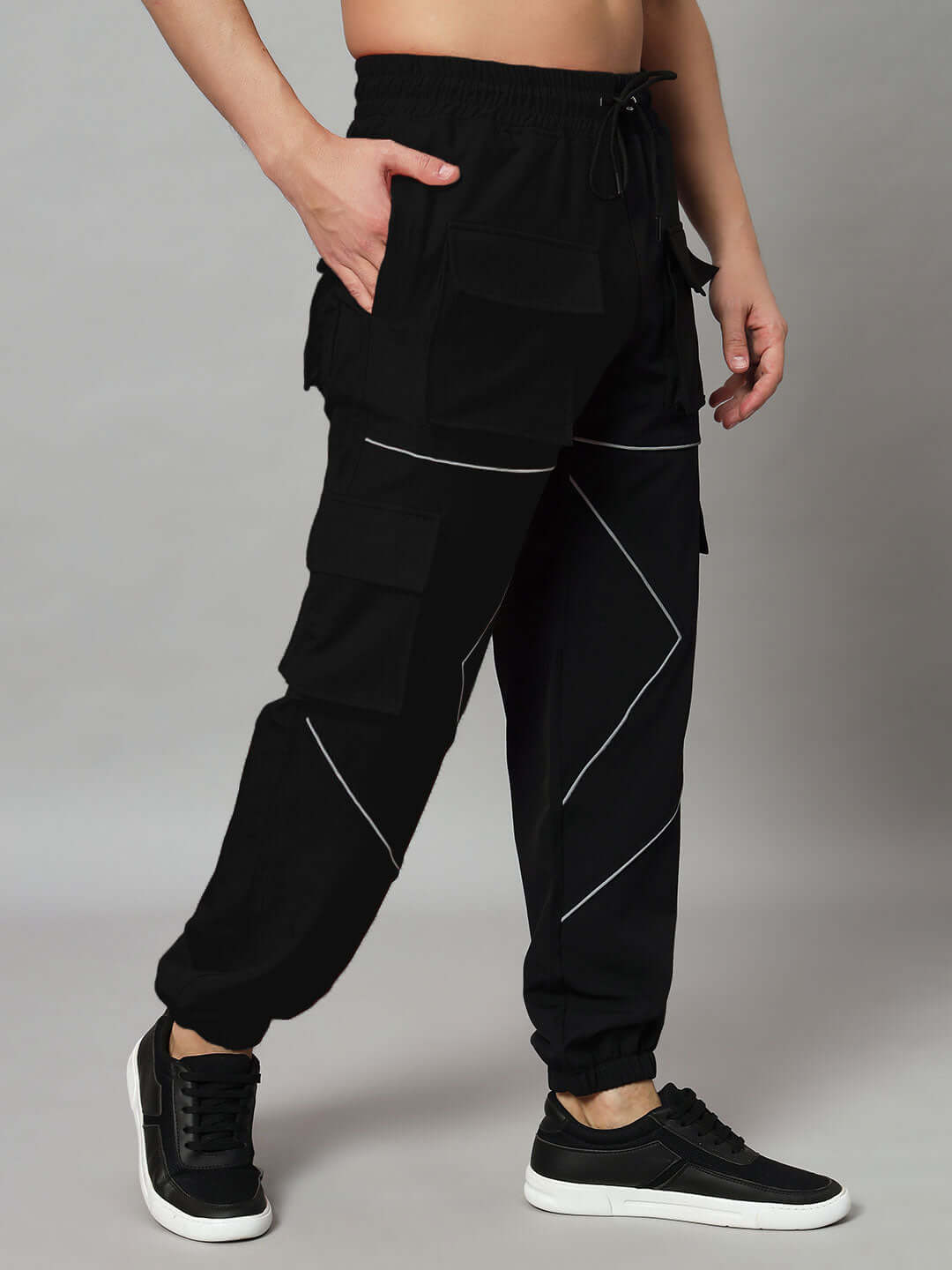 Frontline Reflector Parachute Cargo Pant Black with reflective accents and utility pockets, perfect for trendsetters seeking style and utility.