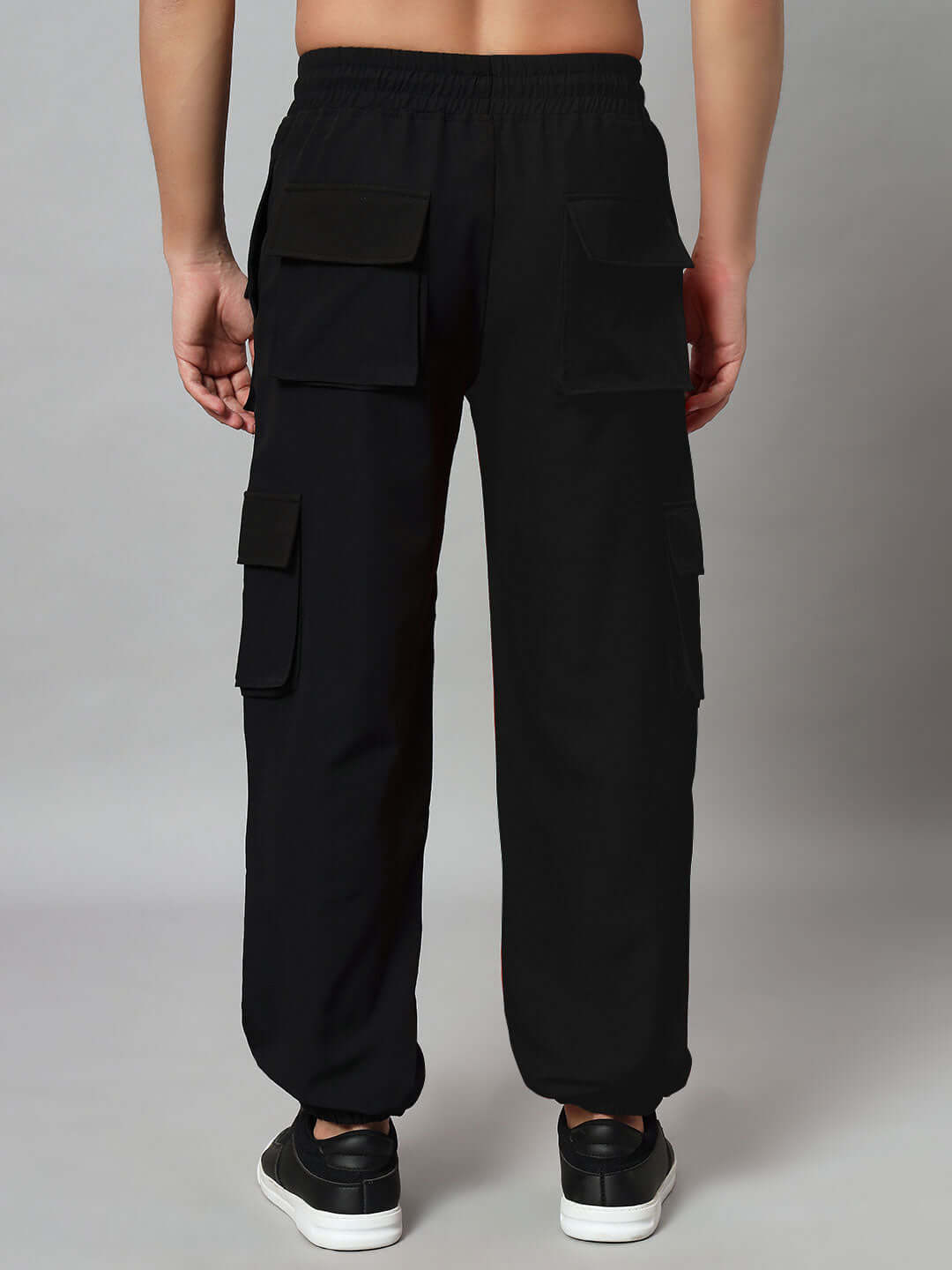 Back view of FRONTLINE REFLECTOR PARACHUTE CARGO PANT BLACK with pockets and reflective accents
