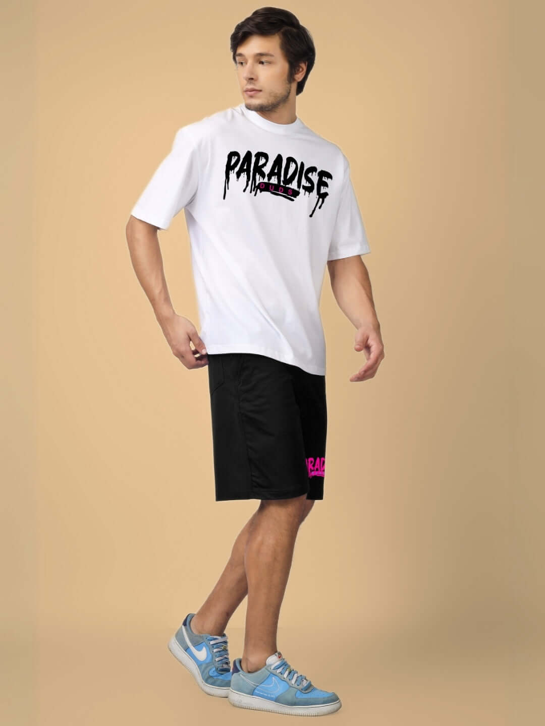 Model wearing FULNESS PARADISE CO-ORD SET WHITE BLACK, featuring bold streetwear t-shirt and shorts for casual hangouts.