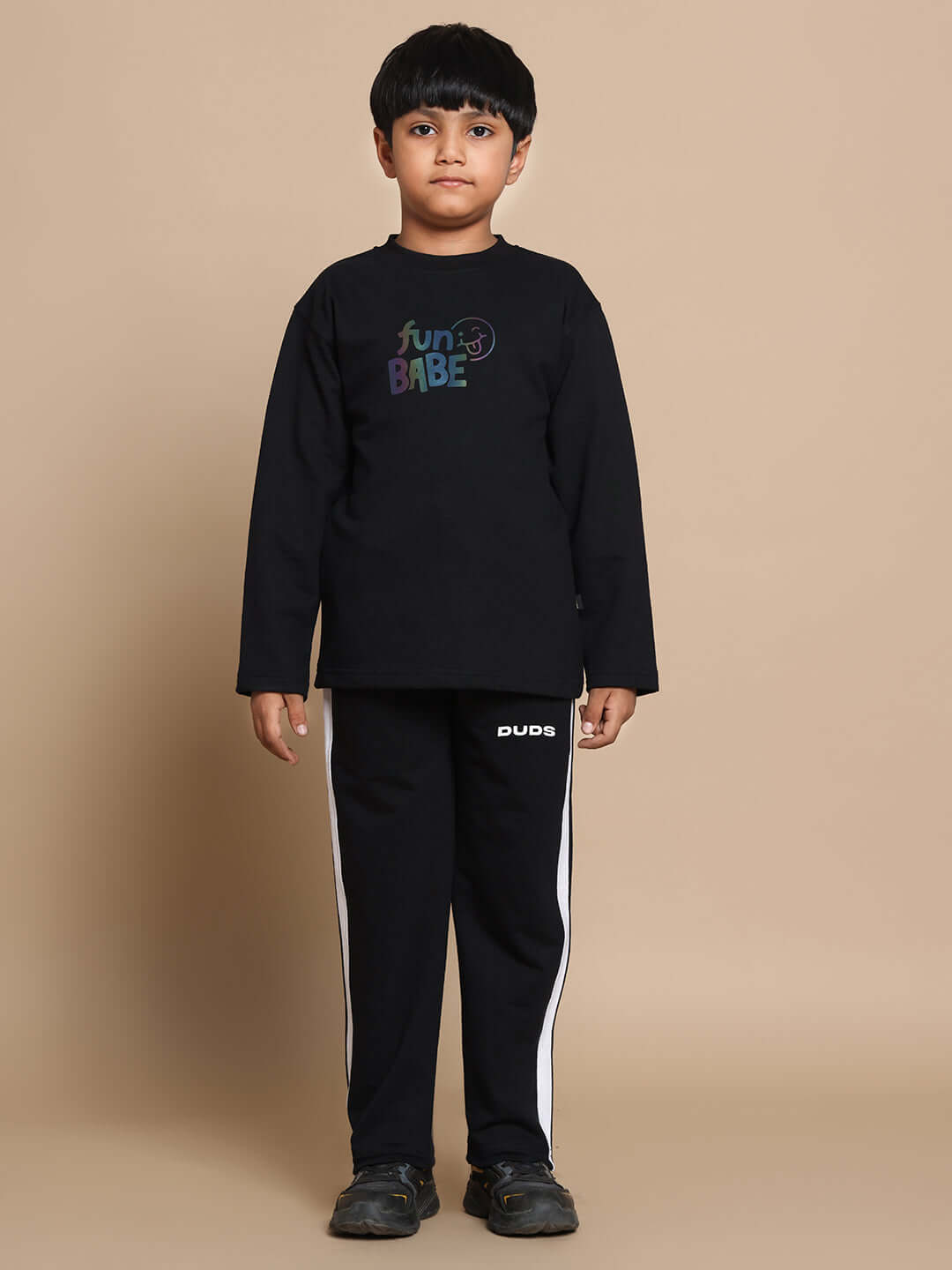 Child wearing Fun Babe black co-ord set, made-to-order by DUDS, suitable for boys and girls; custom fit available.