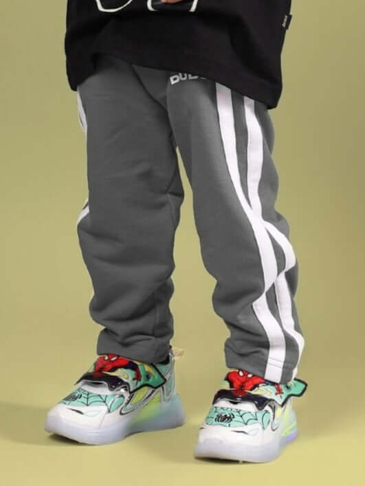Grey Future Icon Jogger for Boys & Girls, made-to-order by DUDS, with customizable size option, shown worn by child.