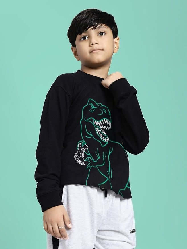 Child wearing GAMEING REX PRINT SWEATSHIRT FOR BOYS GIRLS BLACK with dinosaur graphic, showing style and comfort.