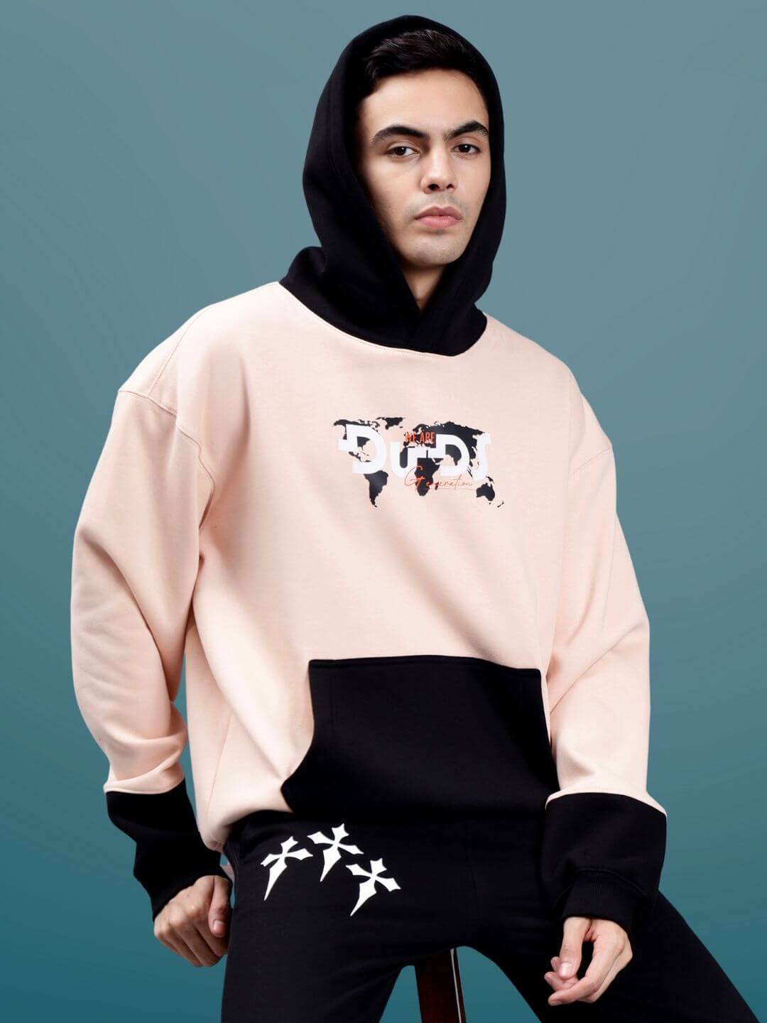 GENERATION DUDS FLEECE COLORBLOCK OVERSIZE HOODIE on male model against blue background
