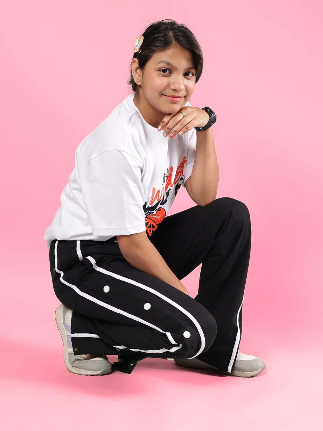 Child wearing GIXXER CO-ORD FOR BOYS & GIRLS WHITE-BLACK posing on pink background, showcasing comfort and style.