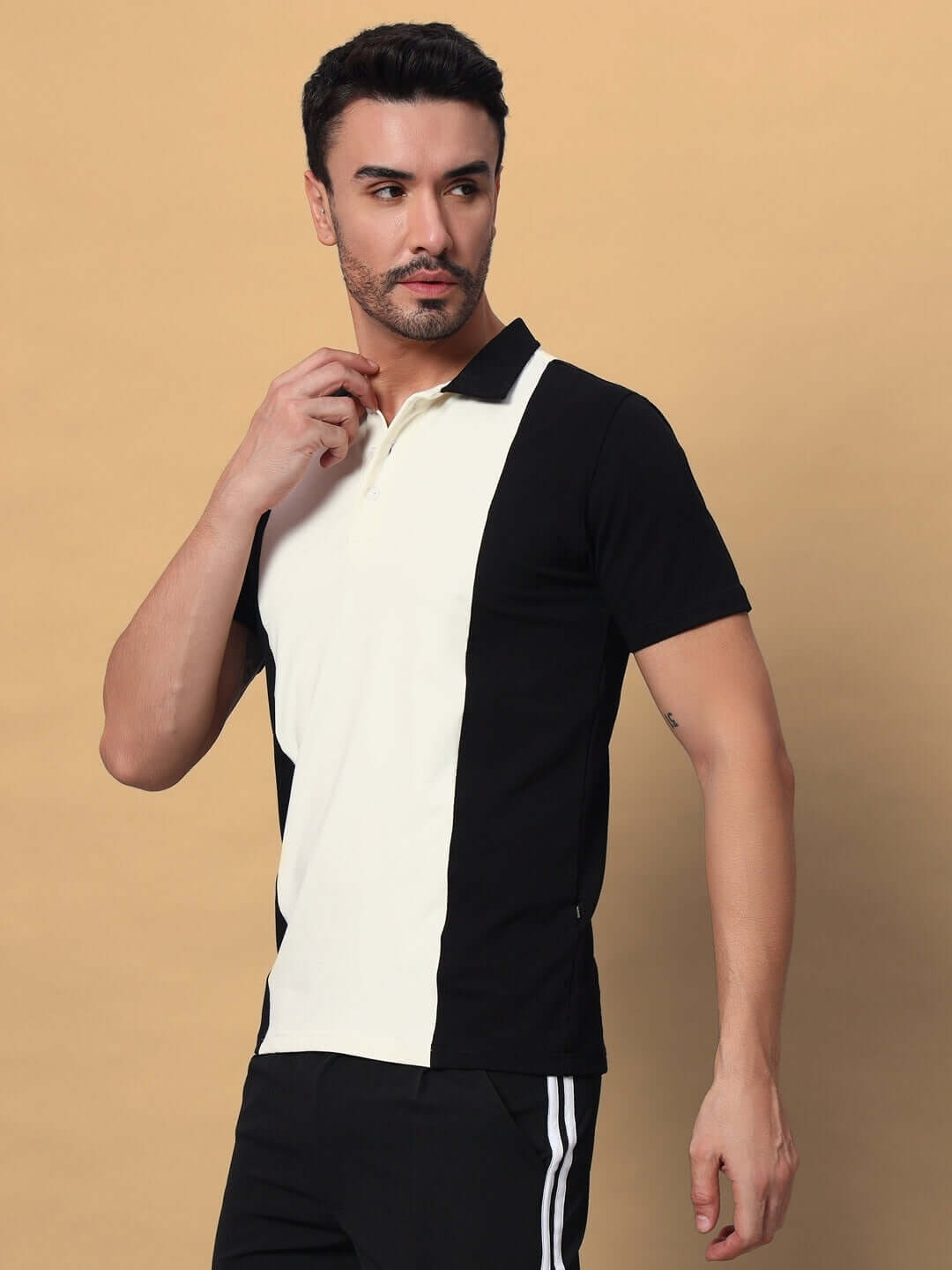 Model wearing GLORY Regular Fit T-Shirt in Black-Off White, crafted from 97% cotton with 3% elastane, showcasing a stylish and comfy design.