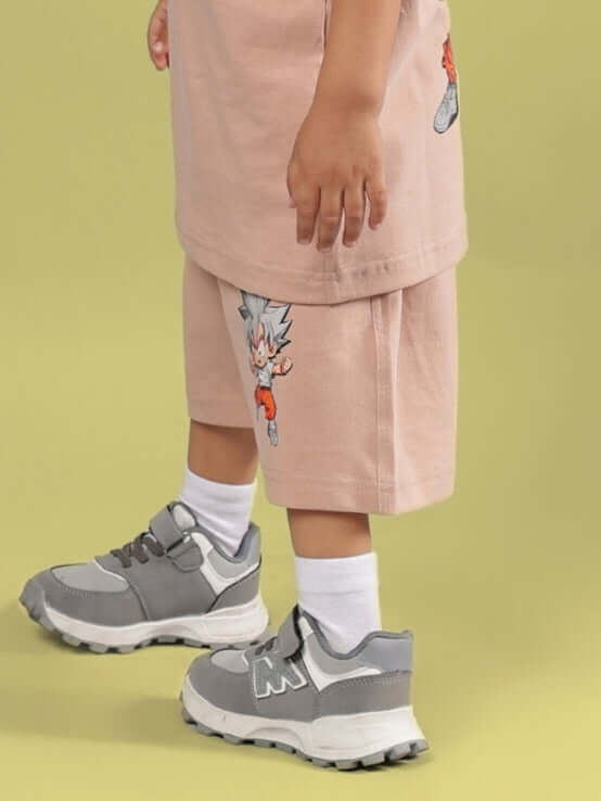 GOHAN SHORTS FOR BOYS & GIRLS BEIGE with cartoon character, shown on child, tailored fit option, designed by DUDS.
