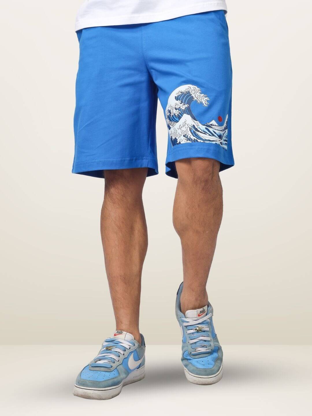 Blue shorts featuring The Great Wave print, regular fit with customization option, stylish design suitable for casual wear.