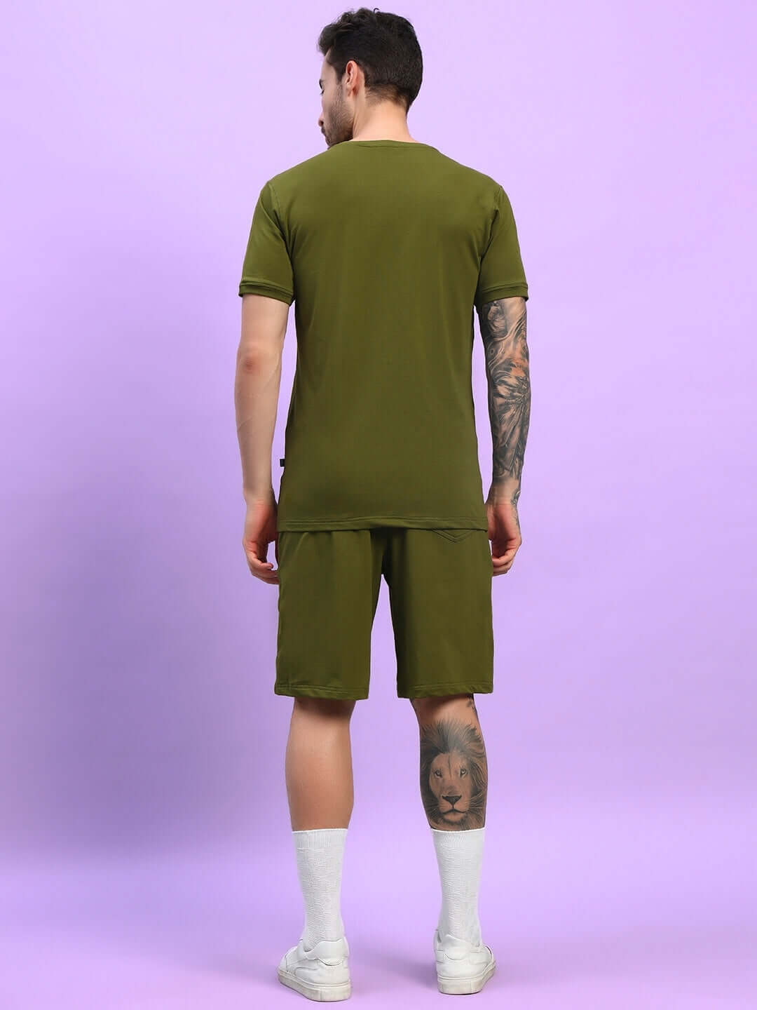 Back view of man wearing GREEBLE Co-ord Set in olive green, made from premium cotton French Terry Lycra, showcasing modern casual style.