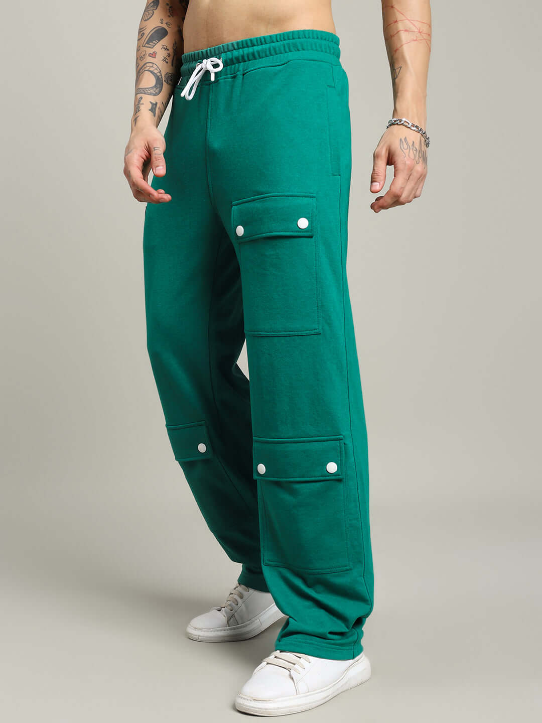 AWESOME FLAP POCKET BAGGY JOGGER GREEN for men, showcasing relaxed fit and street-style in vibrant green, ideal for urban fashion and activity.