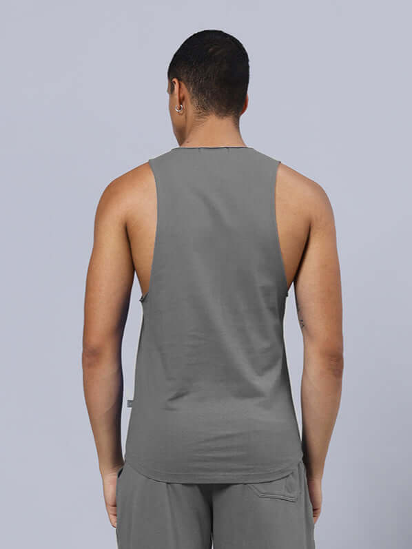 Back view of ANIMAL PRINTED GYM T-SHIRT GREY showcasing sleeveless design and fit on model