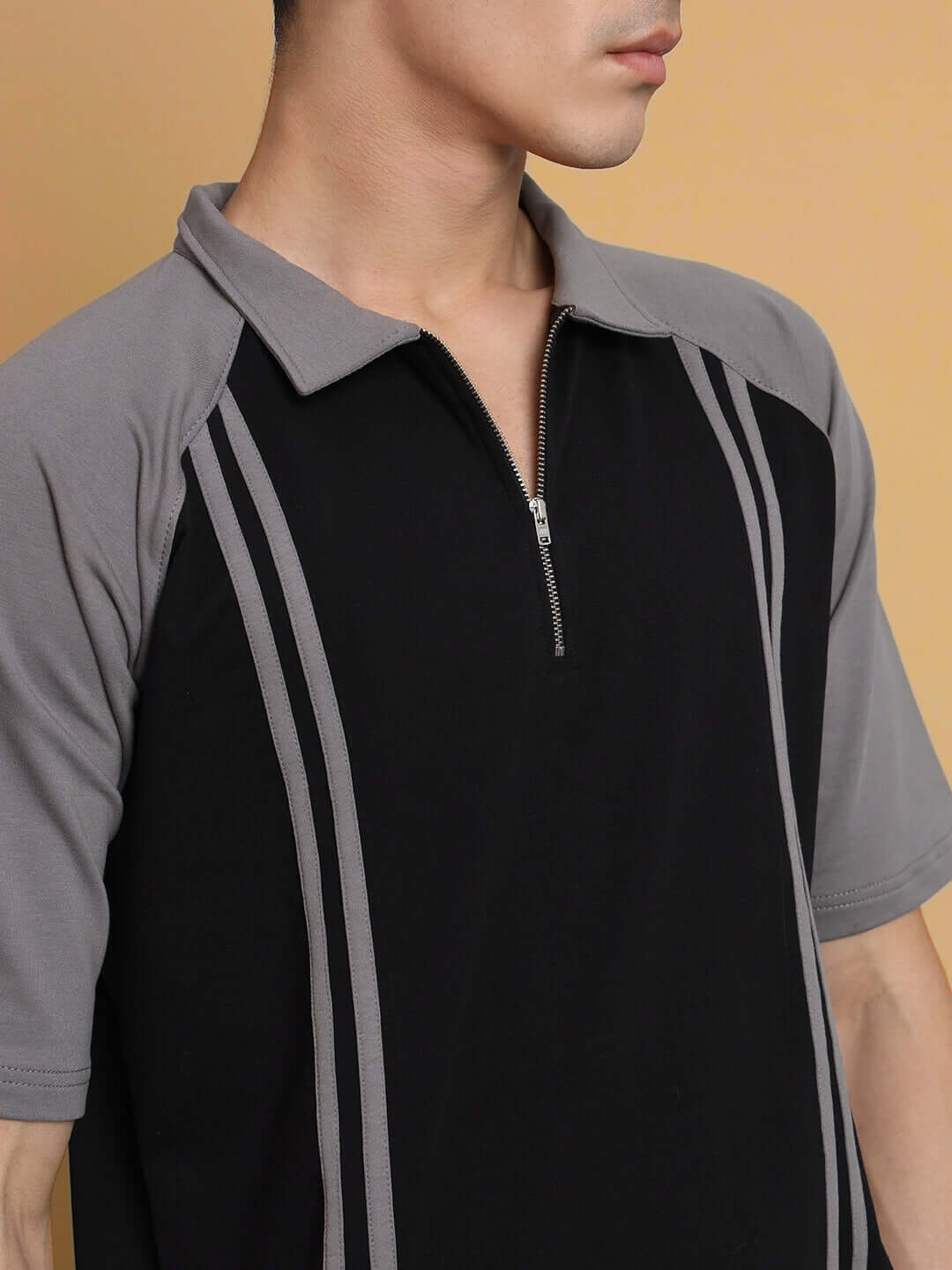 Men's black and grey stripe raglan T-shirt with zip, made from premium cotton and French Terry Lycra. Stylish, comfortable casual wear.