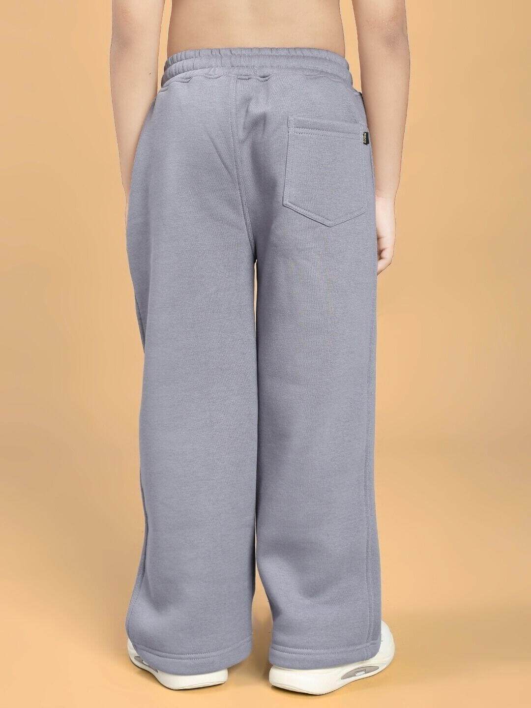 Rear view of MAKE IT HAPPEN FLEECE JOGGER FOR BOYS AND GIRLS GREY, highlighting ultra-soft brushed fleece and stylish design.