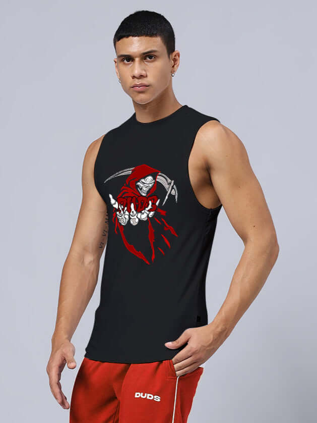 Man wearing GRIM REAPER PRINTED RELAXED FIT GYM T-SHIRT BLACK, showcasing gym fashion.