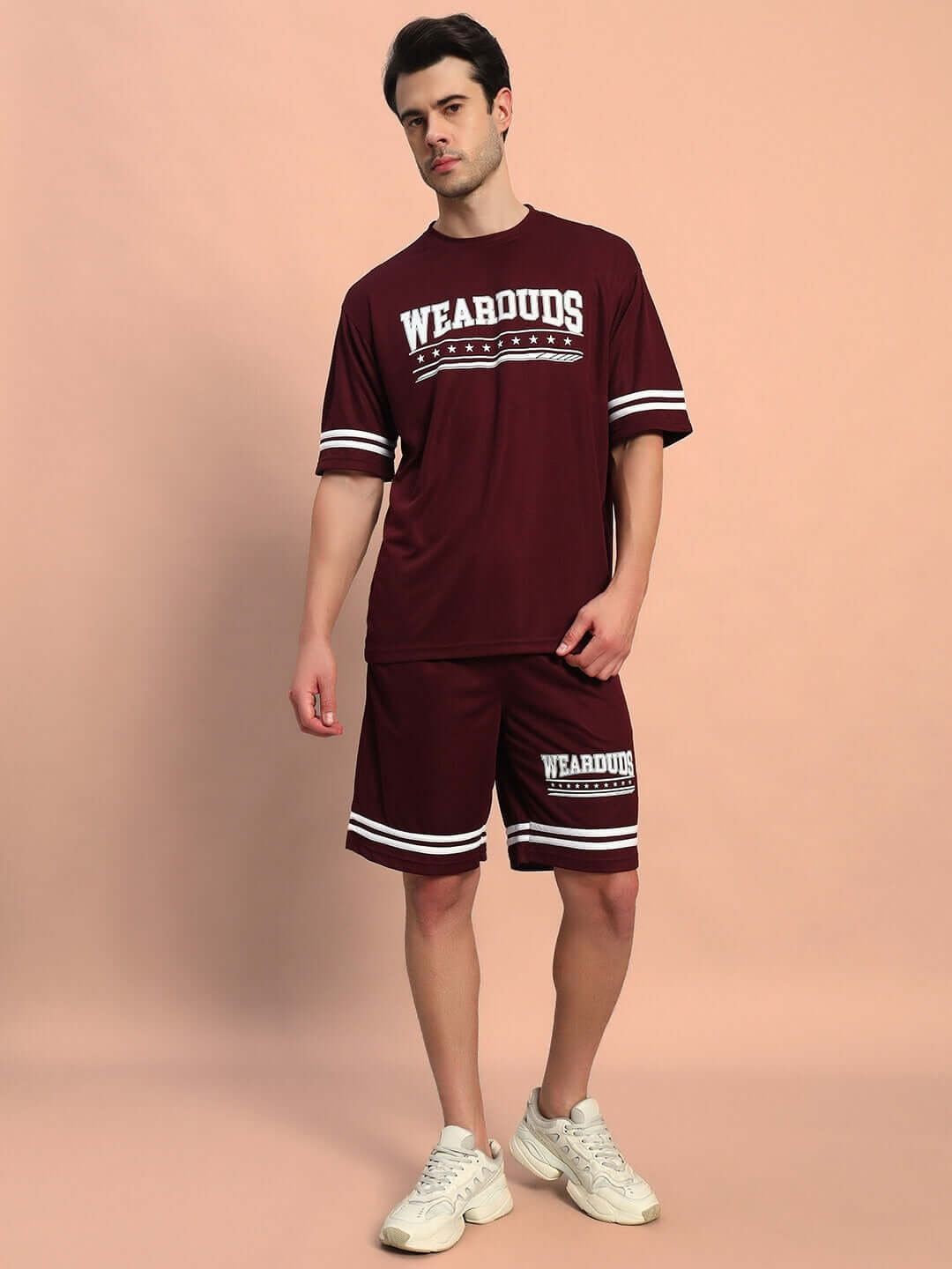 Man wearing GROOVY COLORBLOCK CO-ORD SET WINE by WEAR DUDS, featuring wine color with white accents, ideal for vibrant streetwear.