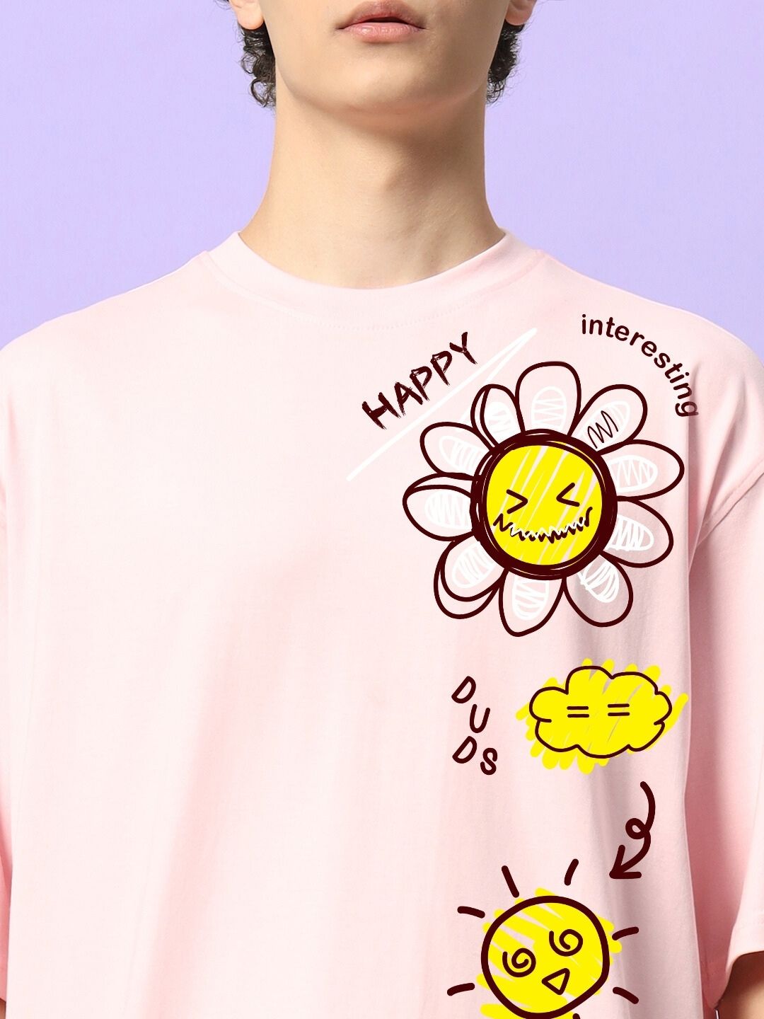HAPPY INTERESTING OVERSIZED T-SHIRT PINK with floral and sun graphic, worn by a model against a purple background.