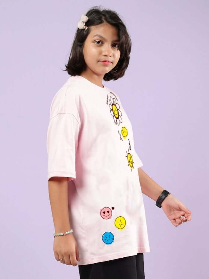 Girl wearing Happy Interesting Oversized T-Shirt for Boys and Girls Pink with playful design.