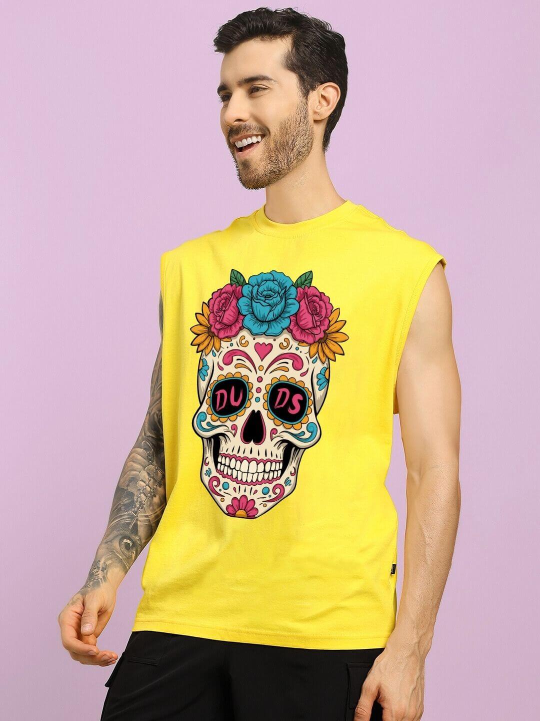 Man wearing a HAPPY SKULL PRINTED GYM T-SHIRT YELLOW against a purple background.