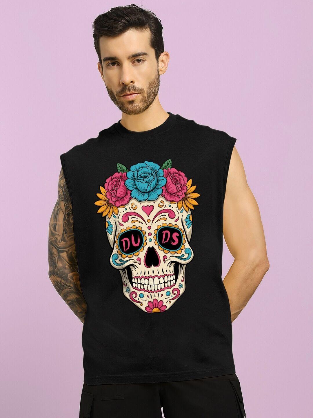 Man wearing HAPPY SKULL PRINTED GYM T-SHIRT BLACK with colorful skull design on purple background.