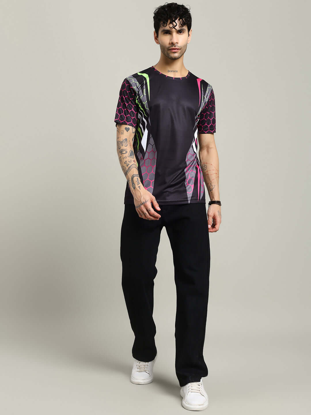 Model wearing HEXAGON PRINTED REGULAR FIT T-SHIRT BLACK with modern hexagon design, a stylish choice for casual wear.