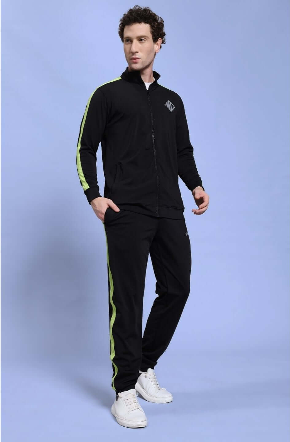 Model wearing the HIGH PERFORMANCE CO-ORD SET BLACK with zip-up hoodie and tapered joggers, showcasing athletic and casual versatility.