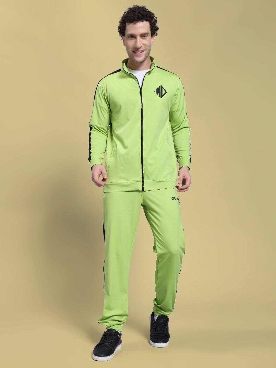 HIGH PERFORMANCE CO-ORD SET NEON GREEN, athletic man in bright tracksuit, showcasing breathable fleece hoodie and joggers, perfect for workouts.