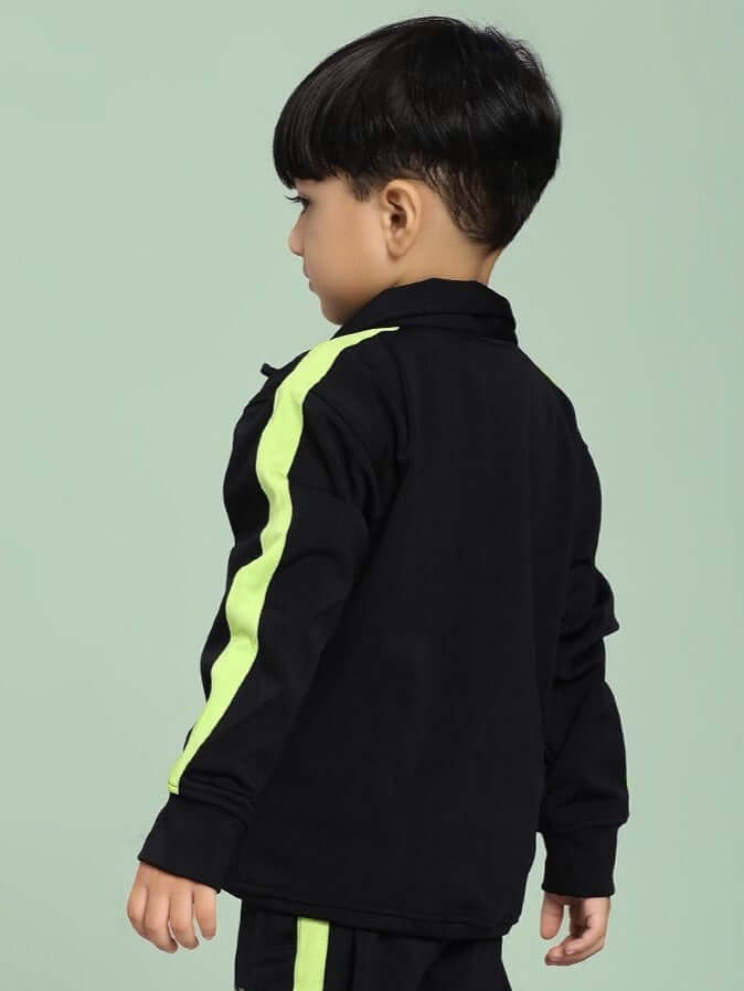 Child wearing High Performance Jacket for Boys and Girls Black with green stripes, showcasing back view