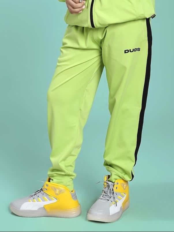 Child wearing High Performance Jogger for Boys and Girls Neon Green, showcasing stylish and comfortable design for active kids.