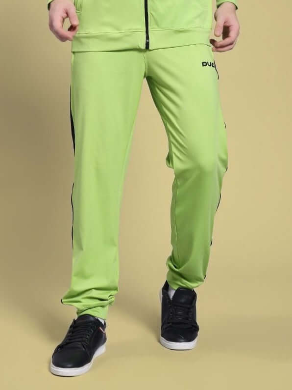 Alt Tag: Person wearing HIGH PERFORMANCE RELAXED FIT JOGGER NEON GREEN showcasing style and comfort.
