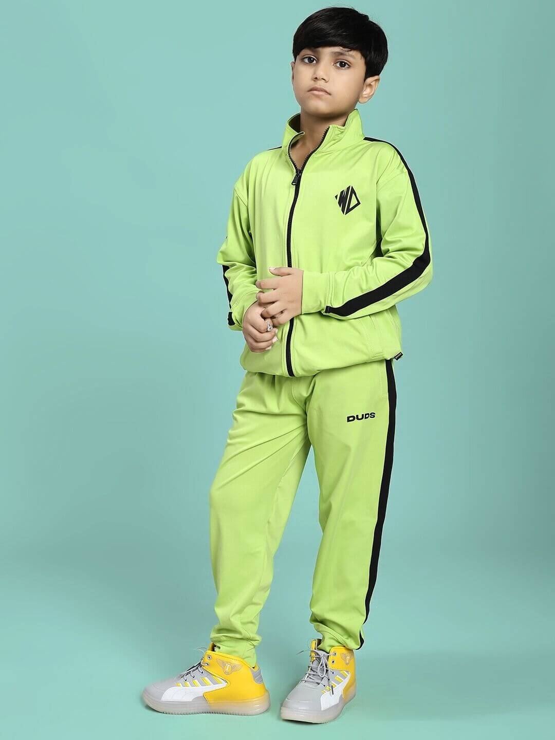 Child wearing the HIGH PERFORMANCE CO-ORD SET FOR BOYS AND GIRLS NEON GREEN suitable for active kids' comfort and style.