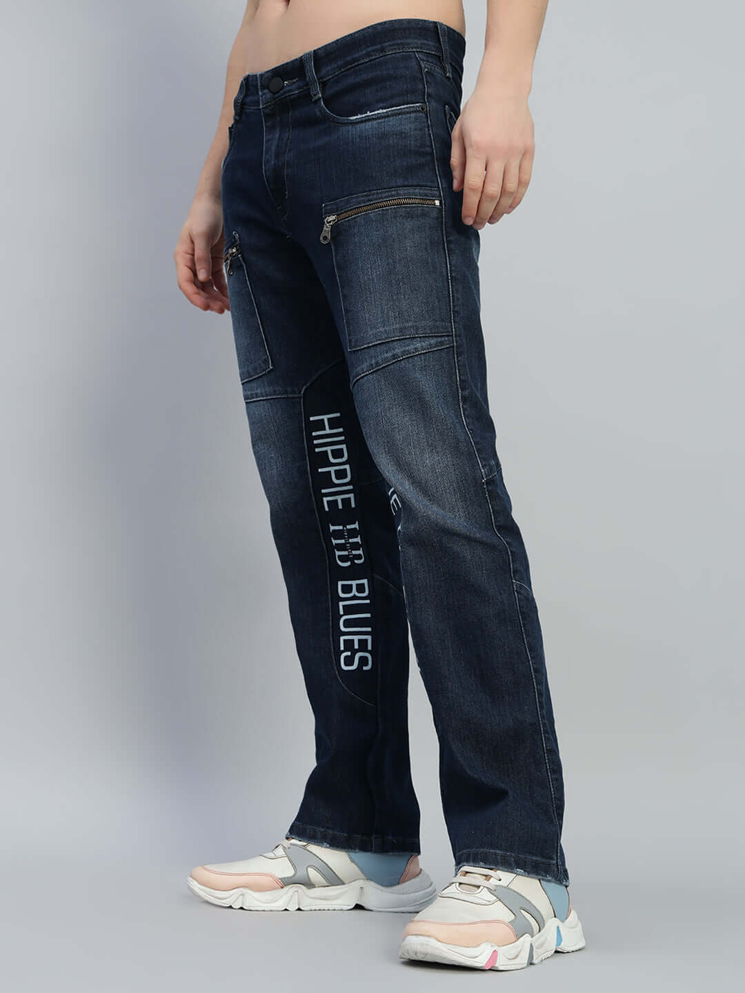 Person wearing HIPPIE BLUE regular fit denim jeans from DUDS, showcasing detailed stitching and modern design.