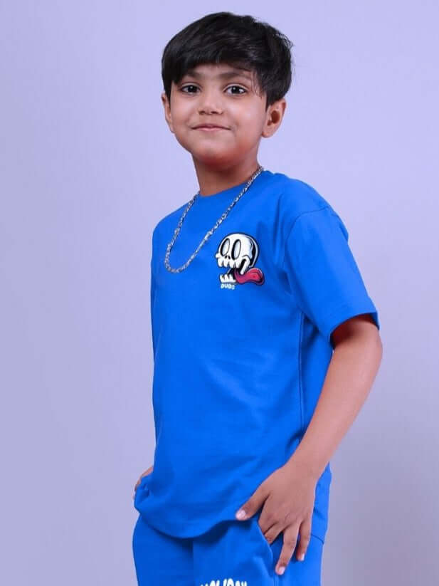 HOLIDAY TIME RIDER PRINT T-SHIRT FOR BOYS AND GIRLS BLUE modeled by a child, featuring a playful design and comfortable fit.