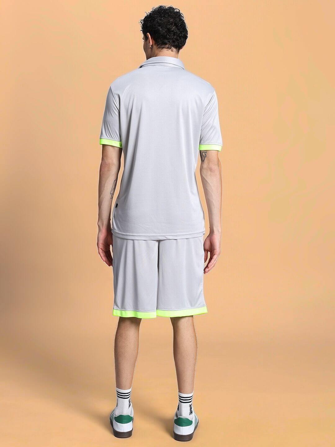 Back view of model wearing HOOKUP SUMMER POLYESTER CO-ORD SET GREY in sporty design.