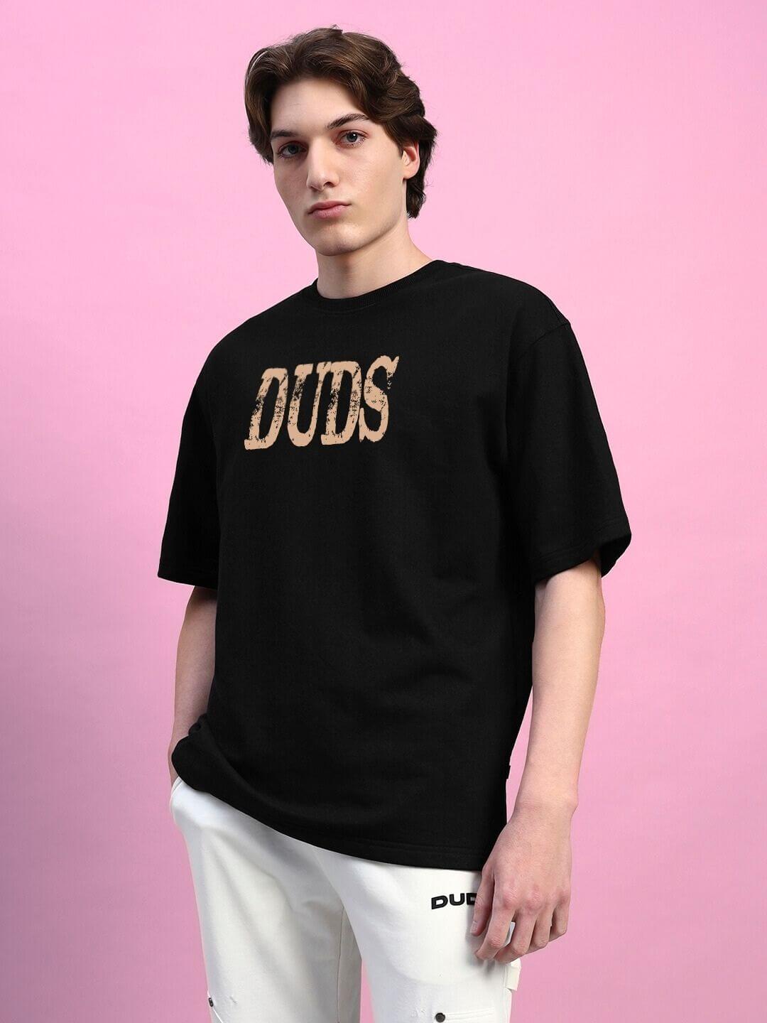 HORNED FIGURE CREATIVE PRINT OVERSIZED T-SHIRT BLACK on model posing against pink background