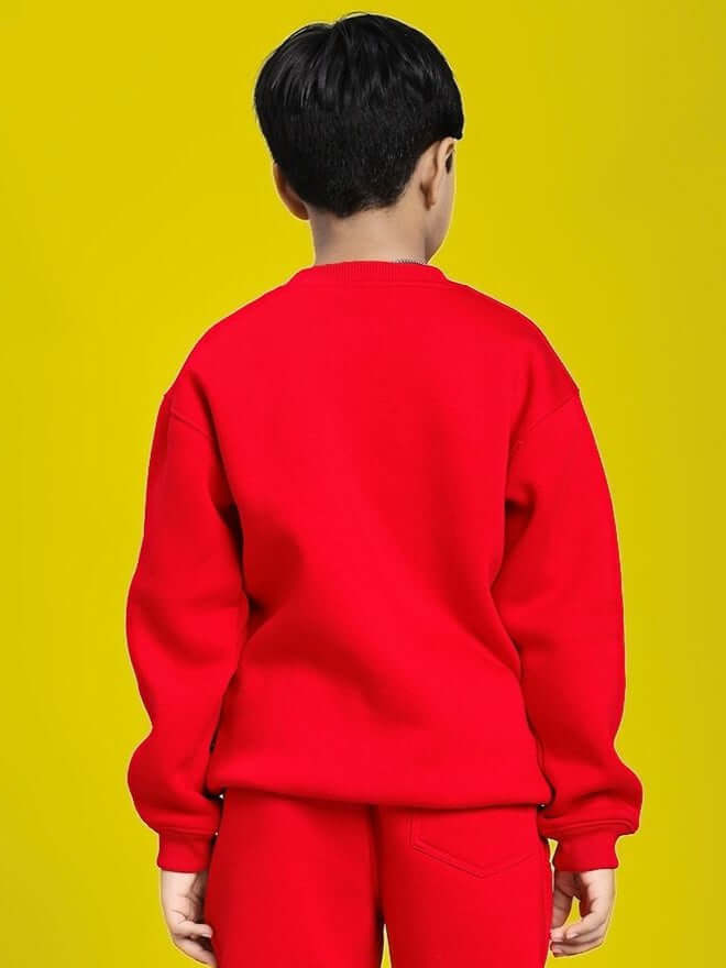 Boy wearing HUG WITH THE DOG FLEECE SWEATSHIRT FOR BOYS AND GIRLS RED, showcasing back view in vibrant red shade.