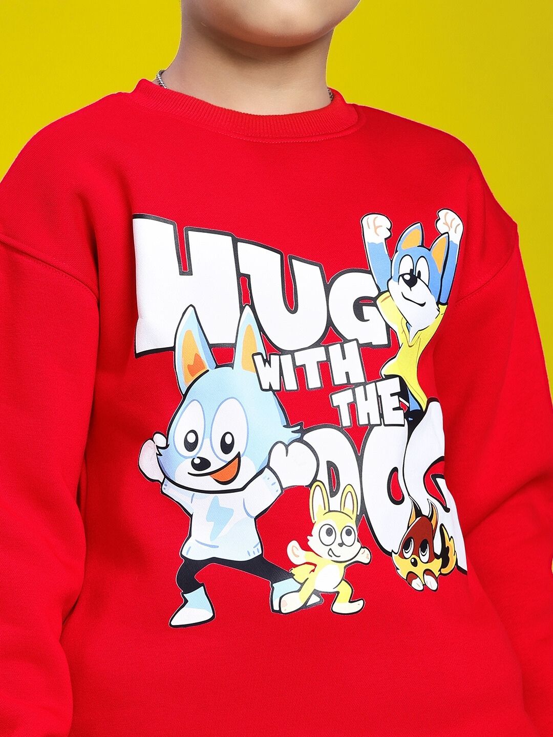 HUG WITH THE DOG FLEECE CO-ORD FOR BOYS AND GIRLS RED featuring playful dog graphic on red background, perfect for cozy kids' wear.