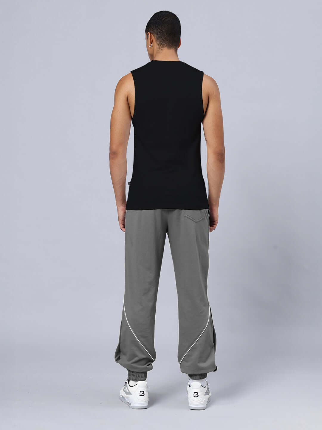Back view of HUNT MODE PRINTED GYM RELAXED FIT CO-ORD SET BLACK-GREY on model demonstrating attire fit and design details.