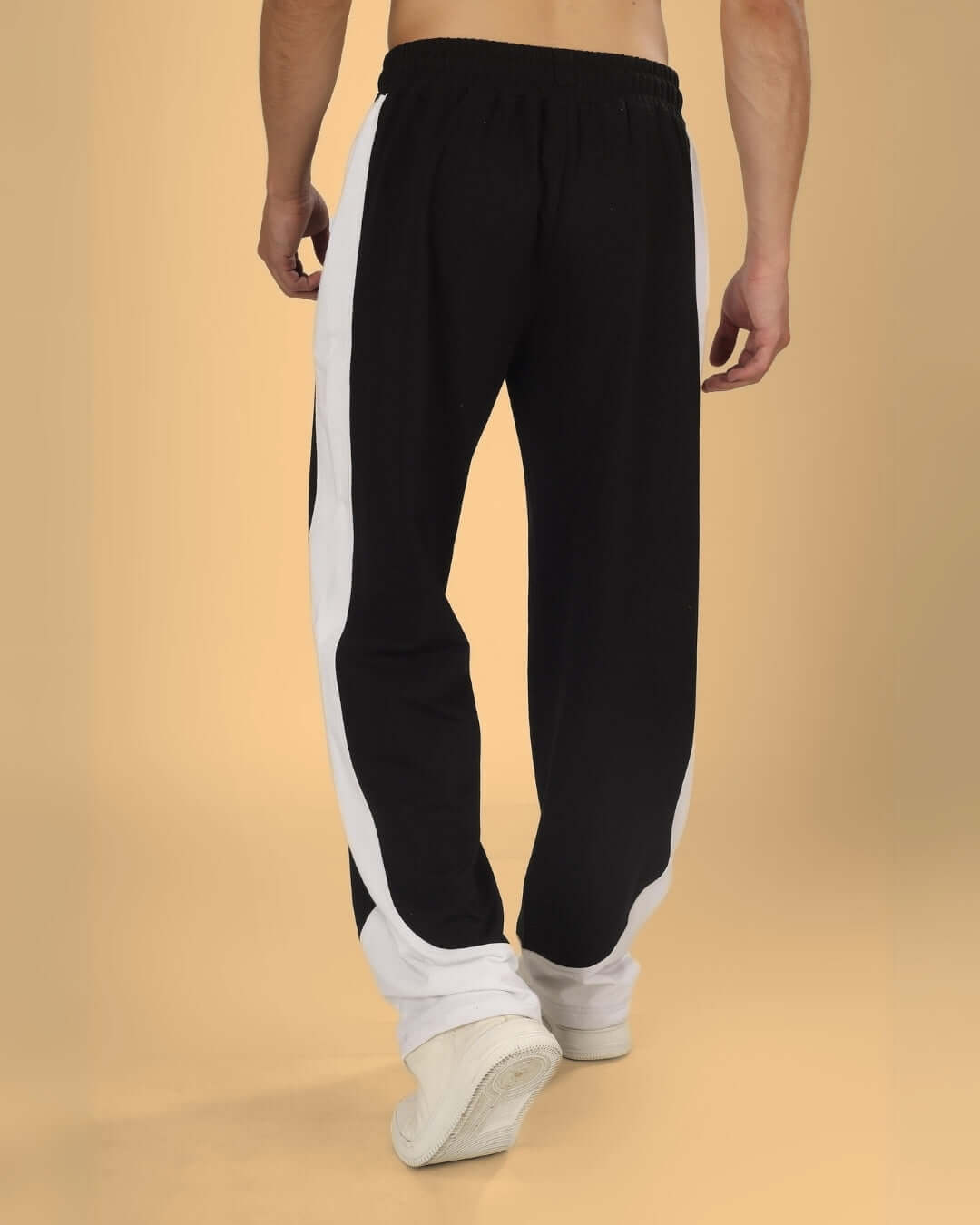 HURTLE Baggy Joggers in Black and White, comfortable fit, customizable size, made to order, featuring a stylish side stripe.