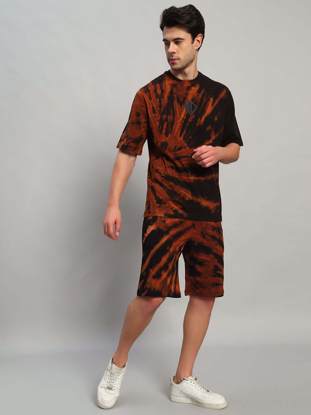 Model wearing HUSTLER TIE-DYE CO-ORD SET BLACK, showcasing streetwear style with breathable cotton-blend fabric and bold design.