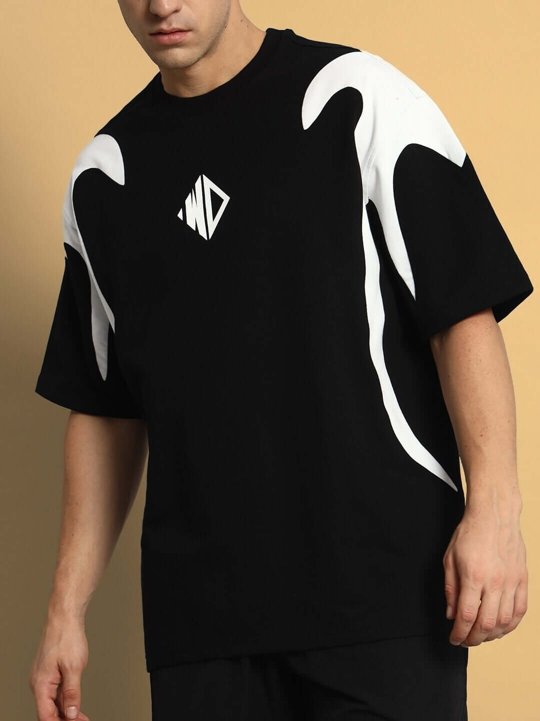 Infinity Saga oversized black t-shirt with white design, premium cotton fabric, bio-washed, 240 GSM, made in India.
