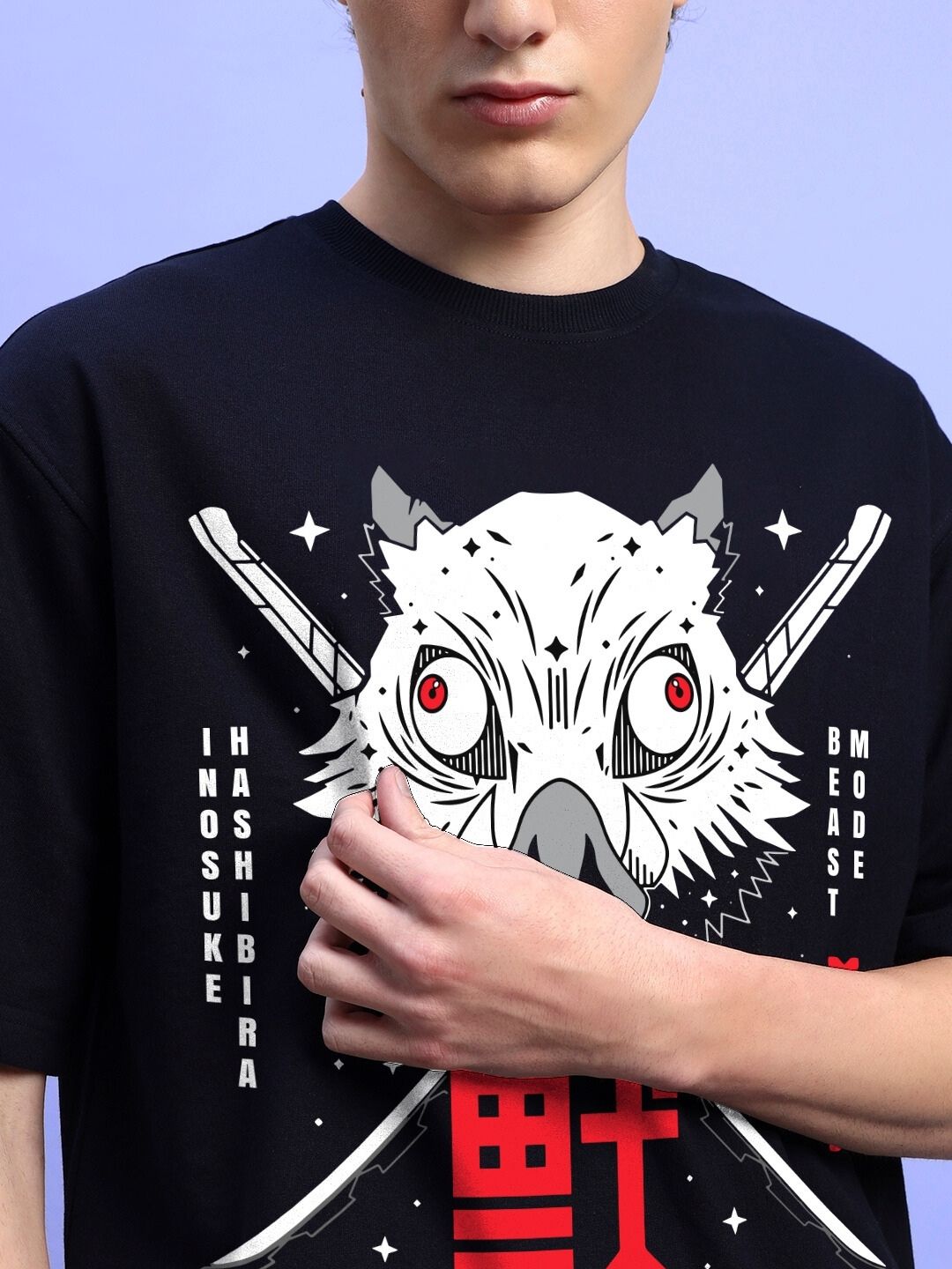 Man wearing INOSUKE PRINT OVERSIZED T-SHIRT BLACK featuring a stylized boar design.