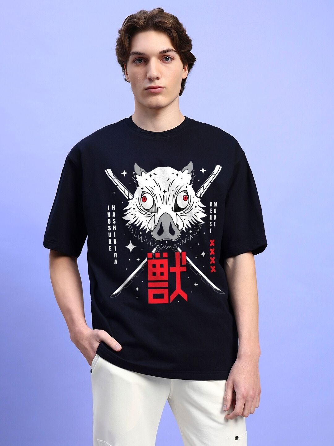 INOSUKE PRINT OVERSIZED T-SHIRT BLACK worn by model against blue background.