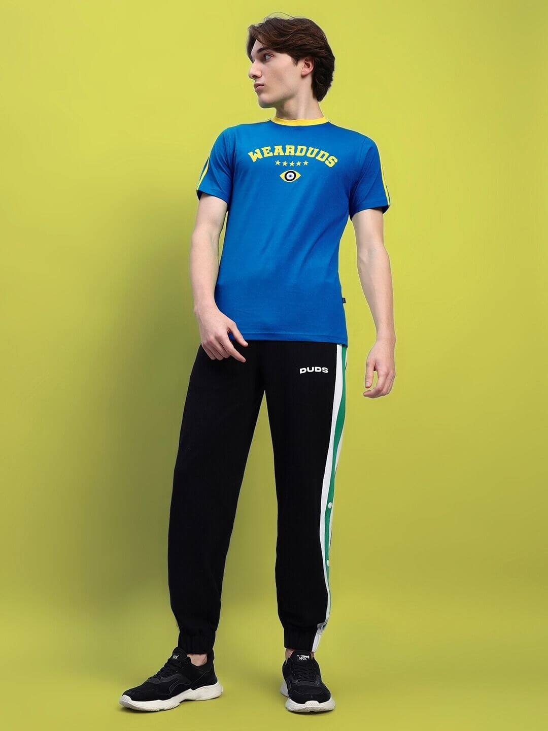 IRISH Regular Fit Blue T-Shirt made of premium 100% cotton fabric, modeled against a vibrant background, highlighting style and comfort.