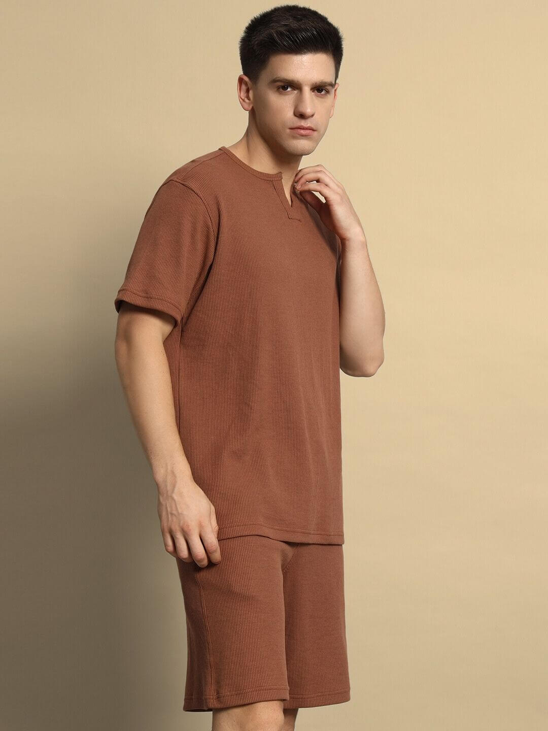 Model wearing Jagger Co-Ord Set in Brown, waffle fabric, 100% cotton, half sleeves, relaxed fit, size large, by fashion brand.