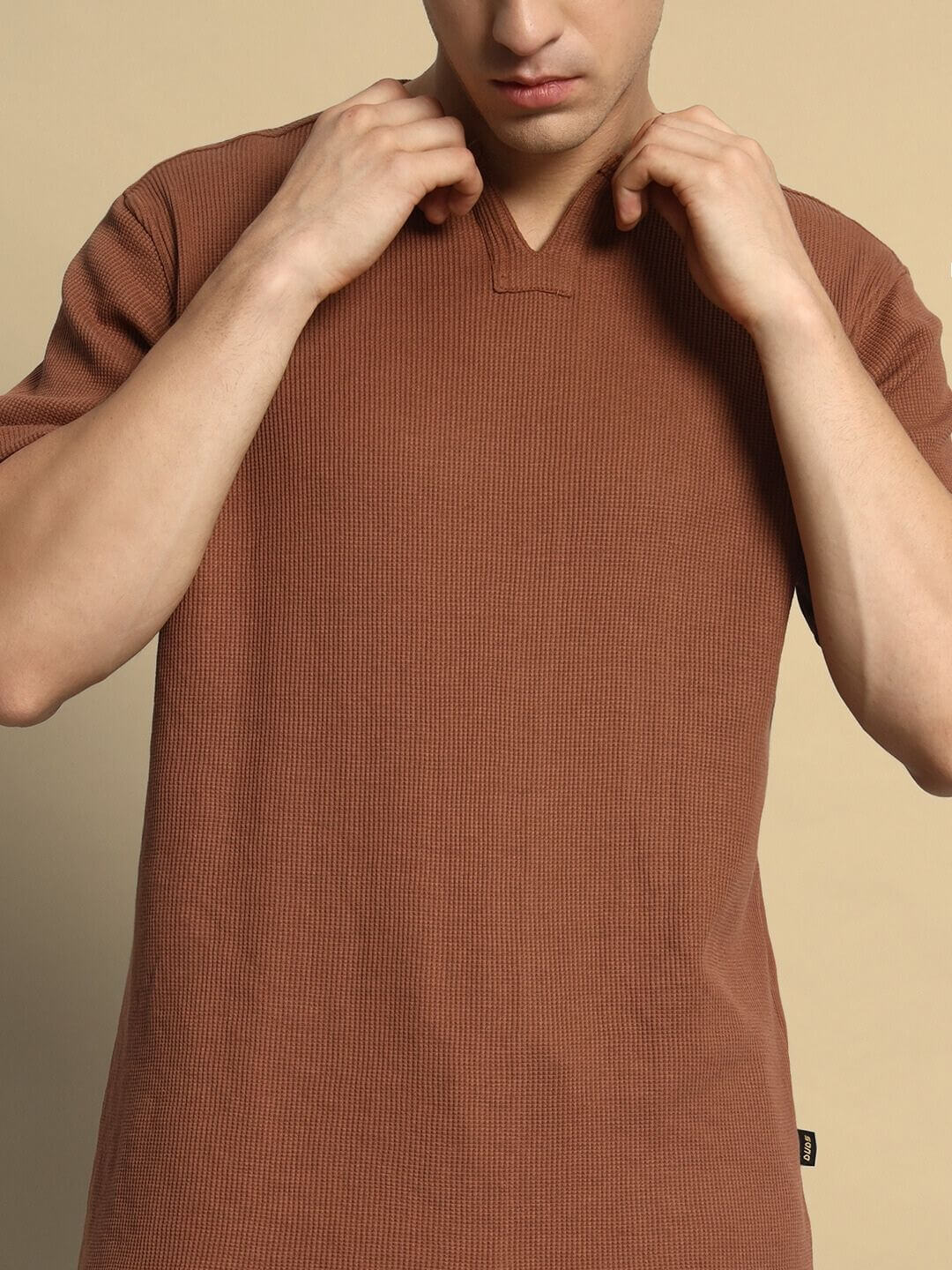 Model wearing JAGGER CO-ORD SET in brown waffle fabric, 100% cotton, 240 GSM, half sleeves, relaxed fit, perfect for casual wear.