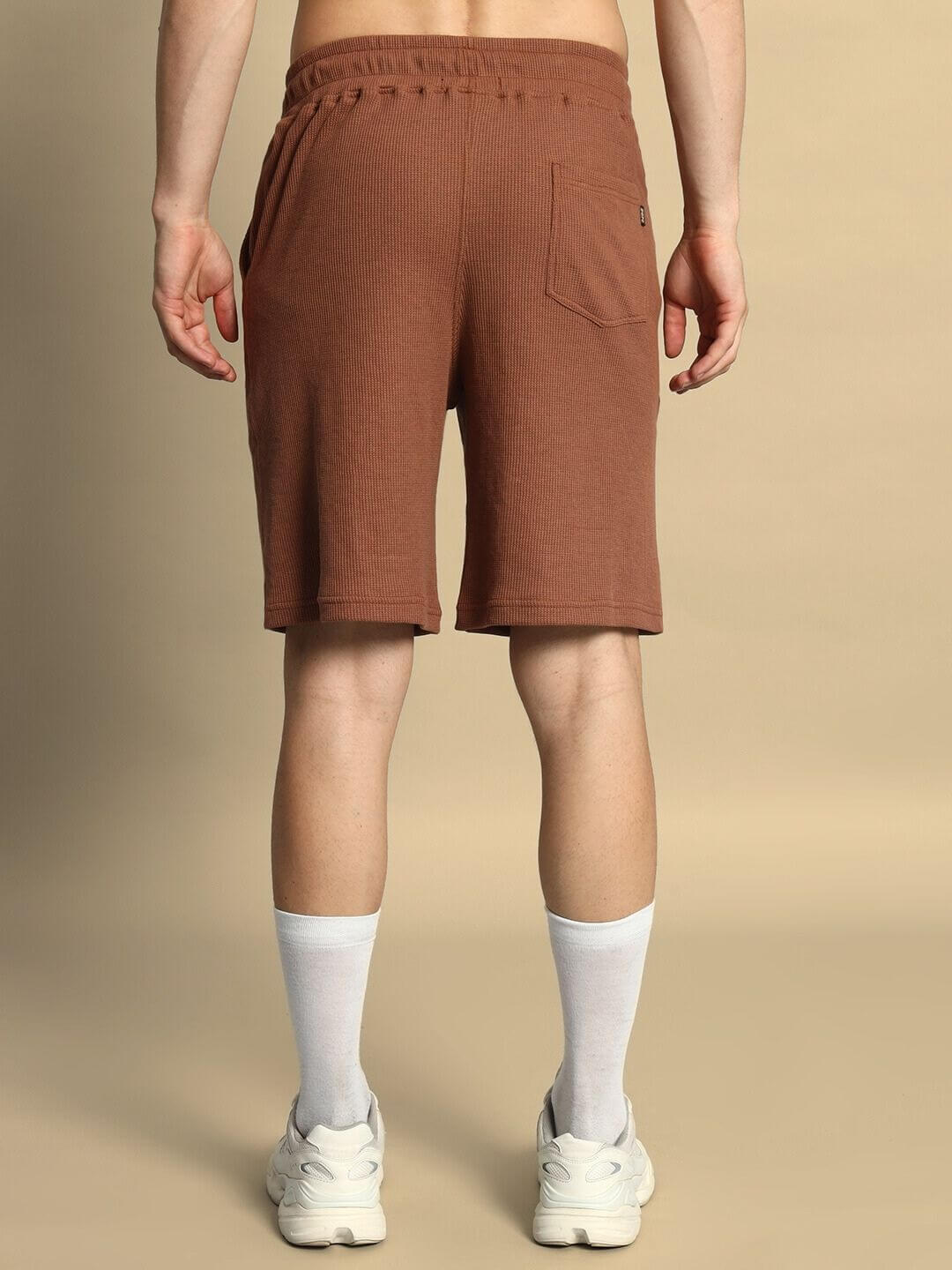 Back view of JAGGER CO-ORD SET in brown waffle fabric, 100% cotton, featuring shorts with an elastic waistband, ideal for relaxed fits.