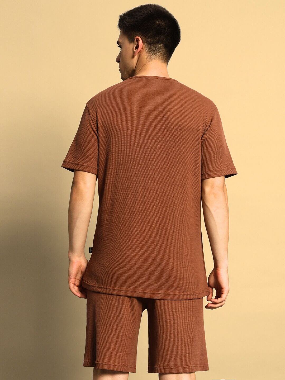 Model wearing Jagger Co-Ord Set in brown waffle fabric with half sleeves, relaxed fit, made from 100% cotton. Perfect casual wear.