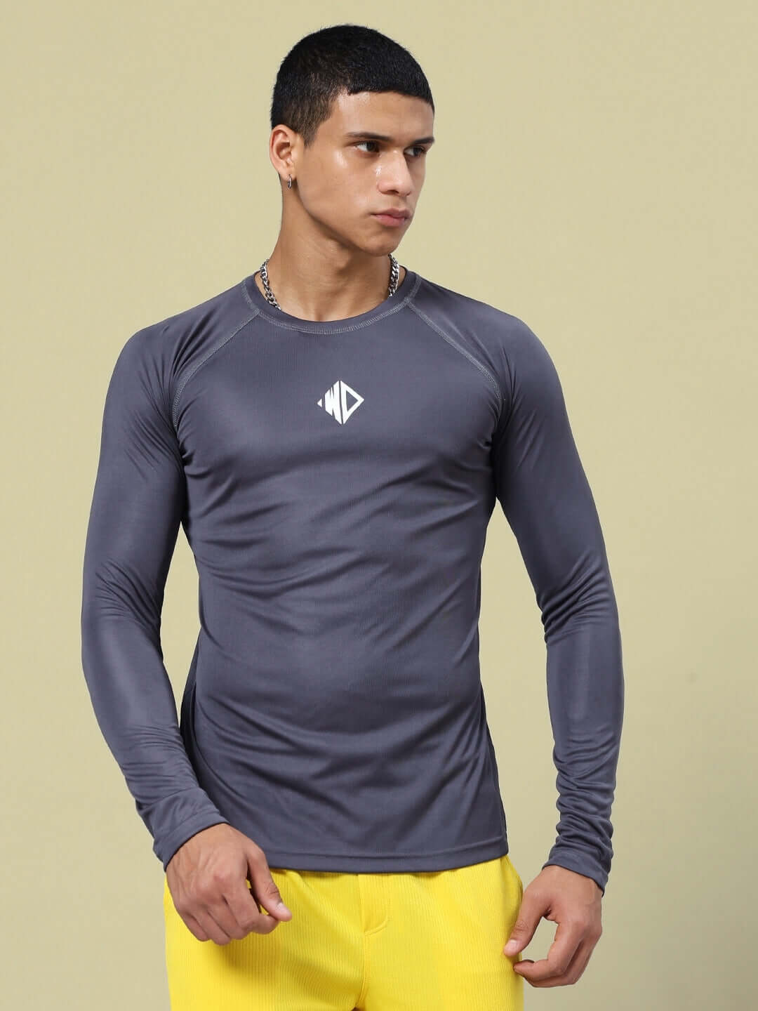 Man wearing JAMES REGULAR FIT T-SHIRT GREY made of sports polyester fabric.