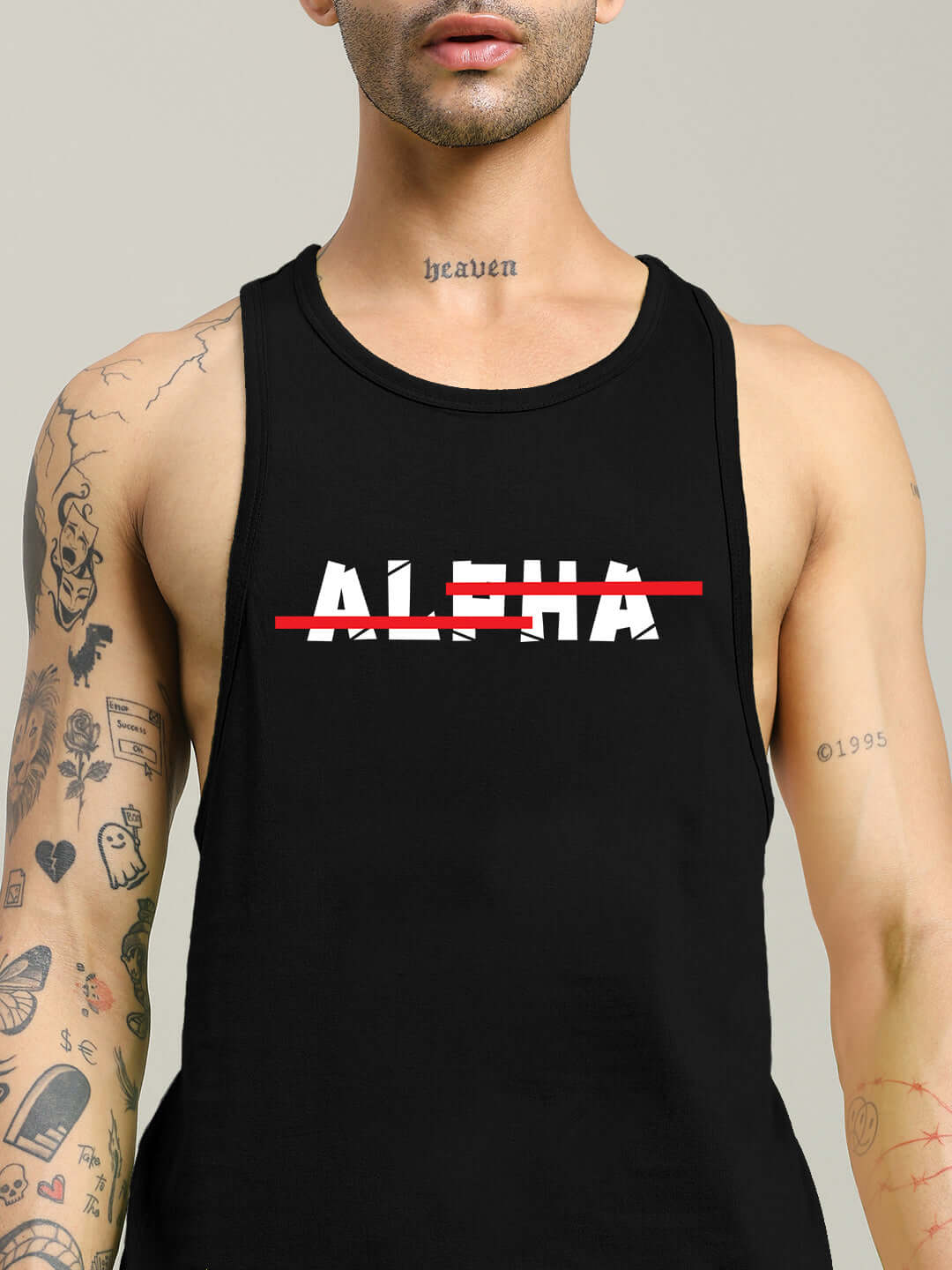 Person wearing JOJO ALPHA PRINTED GYM T-SHIRT BLACK with bold 'Alpha' graphic.