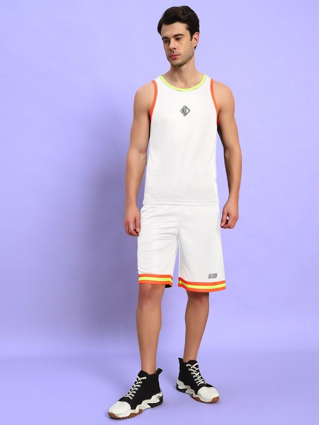 Man wearing JORDAN GYM REGULAR FIT SHORTS WHITE with athletic top against purple background